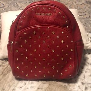 Red Michael Kors backpack purse